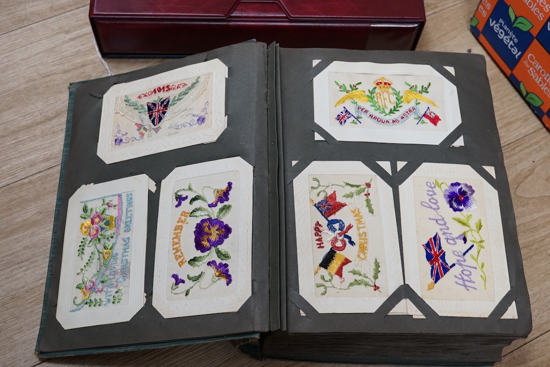 A collection of early 20th century postcards, photographs, etc. Including three albums of novelty postcards, scenes of London, etc. First World War postcards, etc. and an Edwardian photograph album, together with four bo